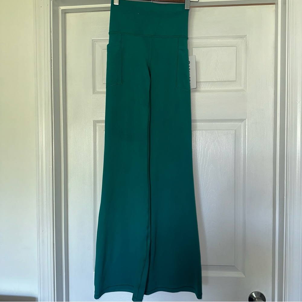 NWT Athleta Salutation Stash Flare Pants XXS Green - Picture 2 of 6